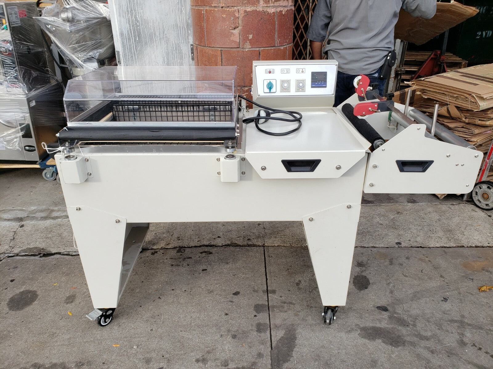 Shrink FM-5540 Wrapping System with Film Dispenser and Sealer