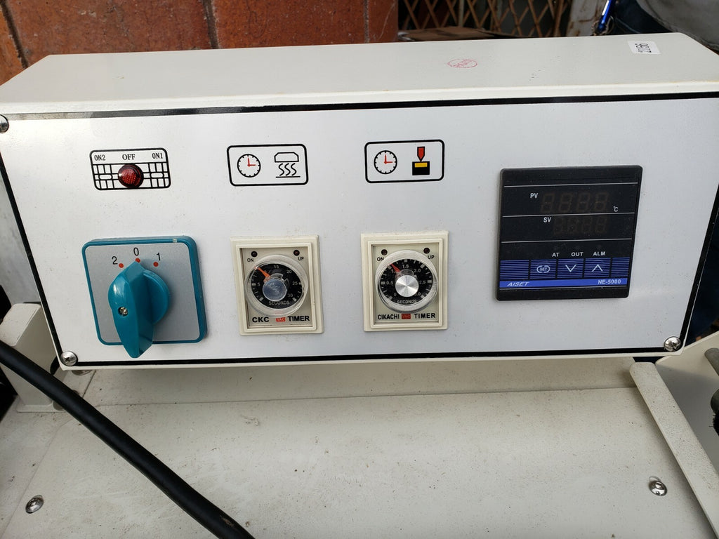 Shrink FM-5540 Wrapping System with Film Dispenser and Sealer